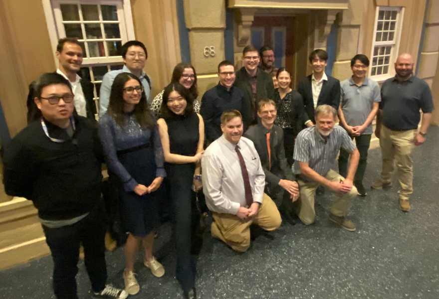 Group photo of individuals standing 