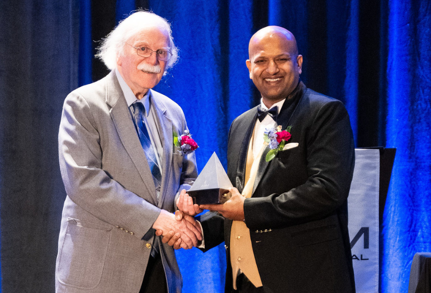 Laughlin receives award from asm president