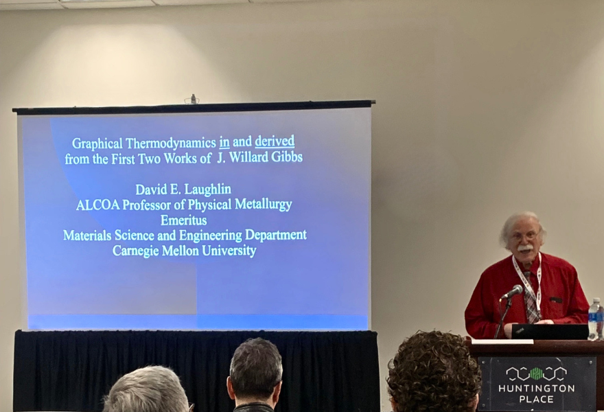 Laughlin giving lecture